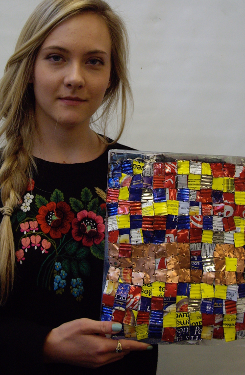 Student with her artwork